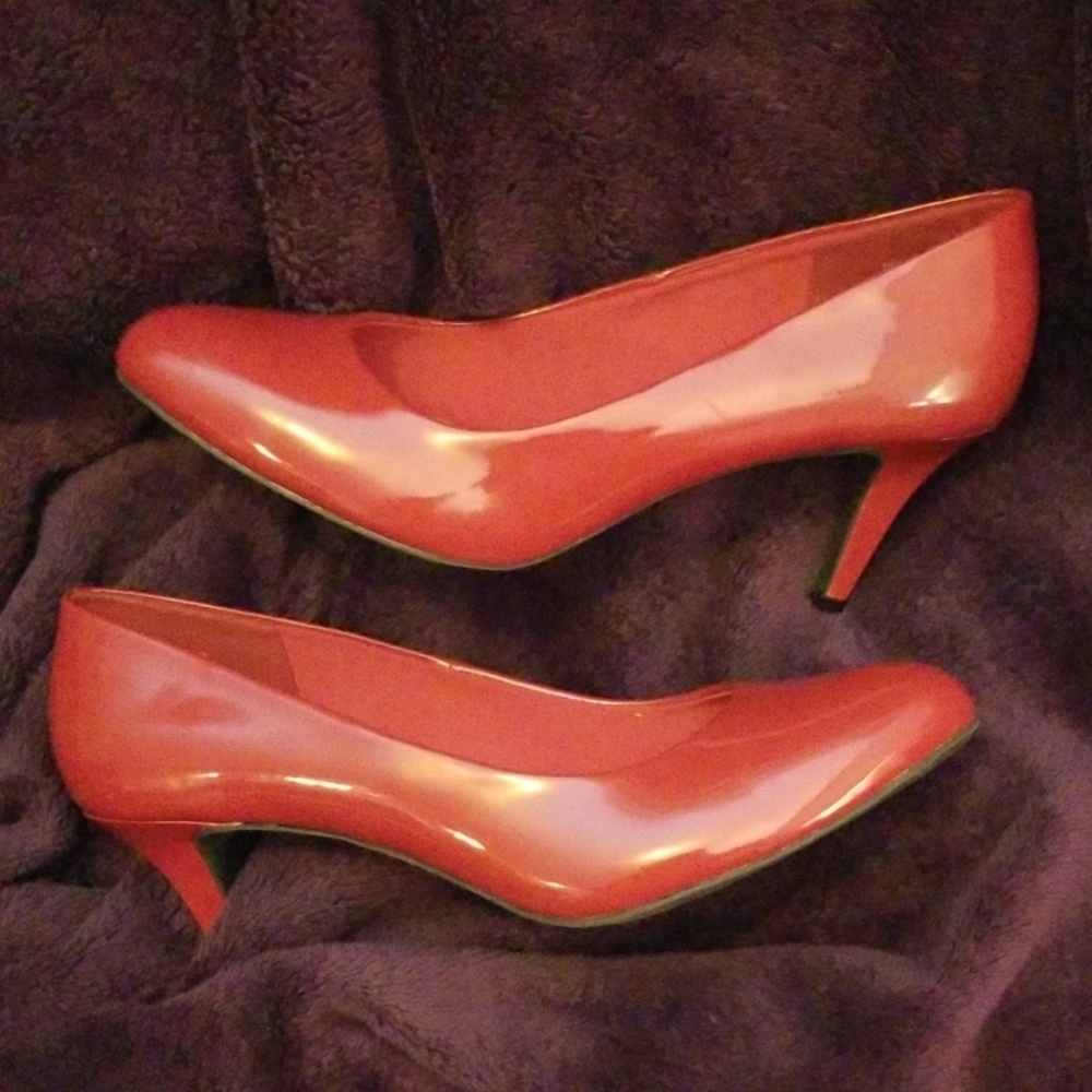 Shiny Red Heels size 12W. Never worn.